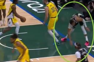 崴脚+膝盖过度伸展！字母哥扣篮落地失衡 捂着左膝！