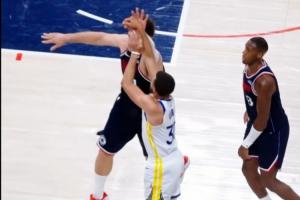 新规库里不适用？库里绝命三分被大洛明显打手 所以才摔在观众席